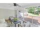 Inviting screened-in porch with cozy seating, ideal for enjoying outdoor living at 5611 Robinhood Rd, Charlotte, NC 28211