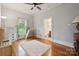 Bright bedroom featuring hardwood floors, area rug, and a charming climbing frame at 626 Cabarrus W Ave, Concord, NC 28027