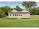 Charming single-story home featuring a light exterior, simple design, and a well-maintained lawn at 626 Cabarrus W Ave, Concord, NC 28027