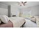 Comfortable main bedroom with carpet, ceiling fan, fireplace and natural lighting at 626 Cabarrus W Ave, Concord, NC 28027