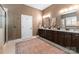 Large bathroom featuring a walk-in shower, double vanity with granite counters, and neutral walls at 6506 Jepson Ct # 349, Charlotte, NC 28214