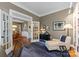 Home office featuring built-in bookcases, a comfortable chair, and ample natural light, ideal for productivity at 6506 Jepson Ct # 349, Charlotte, NC 28214