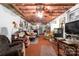Finished basement with a carpet, furniture, and exposed ceiling with a ceiling fan at 7029 Forest Hills Dr # 38, Denver, NC 28037