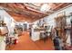 Finished basement with an orange carpet, a partial bar with stools and exposed wooden ceiling at 7029 Forest Hills Dr # 38, Denver, NC 28037