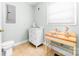 Well-lit bathroom featuring a vanity, toilet, and tile flooring at 7029 Forest Hills Dr # 38, Denver, NC 28037