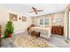 Comfortable main bedroom with neutral walls, wood flooring, and a ceiling fan at 7029 Forest Hills Dr # 38, Denver, NC 28037