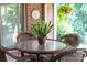 Inviting outdoor seating area with a glass-topped table, perfect for enjoying the backyard at 7029 Forest Hills Dr # 38, Denver, NC 28037