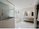Modern bathroom with separate shower and bath at 705 Mcalway Rd, Charlotte, NC 28211