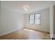 Cozy bedroom with hardwood floors and ample natural light at 705 Mcalway Rd, Charlotte, NC 28211