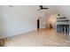 Spacious bonus room features hardwood floors, wet bar, and ample lighting at 705 Mcalway Rd, Charlotte, NC 28211