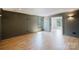 This spacious living area features hardwood floors, light grey walls, and recessed lighting at 705 Mcalway Rd, Charlotte, NC 28211
