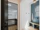 Inviting mudroom with shiplap walls, decorative lighting, and a convenient bench, offering a stylish transition from garage at 705 Mcalway Rd, Charlotte, NC 28211