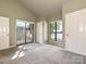 Spacious bedroom with sliding glass doors that leads to patio at 7916 Charter Oak Ln, Charlotte, NC 28226