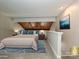 Cozy bedroom loft with carpet and a decorative wood ceiling at 7916 Charter Oak Ln, Charlotte, NC 28226