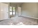 Well-lit bedroom with two closets and a large window at 7916 Charter Oak Ln, Charlotte, NC 28226