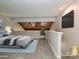 Cozy bedroom loft with carpet, sloped ceiling, and a wall-mounted television at 7916 Charter Oak Ln, Charlotte, NC 28226
