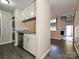 Efficient kitchen featuring stainless steel appliances and granite countertops at 7916 Charter Oak Ln, Charlotte, NC 28226