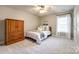 Bright bedroom with a ceiling fan, window with natural light, and spacious closet at 8102 Bergen Ct, Waxhaw, NC 28173