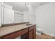Bright bathroom featuring a solid surface vanity and tub shower at 8312 Compton Acres Ln, Waxhaw, NC 28173