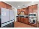 Well-equipped kitchen featuring stainless steel appliances, dark countertops, and ample cabinetry for storage at 8312 Compton Acres Ln, Waxhaw, NC 28173
