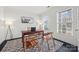 Bright office space featuring hardwood floors, modern furniture, and ample natural light at 8312 Compton Acres Ln, Waxhaw, NC 28173