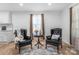 Inviting living room showcasing modern decor, luxury vinyl flooring, and comfortable seating arrangement at 909 Gibbons St, Gastonia, NC 28052