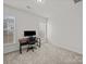 Bedroom featuring neutral walls, carpet, and natural light with room for office at 9582 Creighton Nw Rd, Concord, NC 28027