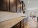 Gourmet kitchen with granite countertops, gas range and a subway tile backsplash at 9582 Creighton Nw Rd, Concord, NC 28027