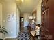 Welcoming foyer with neutral tones and decorative accents at 9608 Brackenview Ct, Charlotte, NC 28214