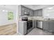 Well-lit kitchen with stainless steel appliances and plenty of counter space at 9639 Green Gable Ct, Charlotte, NC 28270