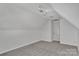 Bedroom features neutral carpeting and track lighting at 11407 Lenswood Ct, Charlotte, NC 28214