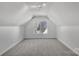 Bedroom features neutral carpeting and overhead lighting at 11407 Lenswood Ct, Charlotte, NC 28214