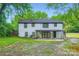 The spacious backyard offers a blank canvas for outdoor living, with plenty of room for activities and gardening at 1224 E Woodlawn Rd, Charlotte, NC 28209
