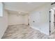Large bedroom with durable flooring, a closet, and a bright atmosphere at 1224 E Woodlawn Rd, Charlotte, NC 28209