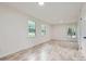 Bright bedroom with ample natural light, complemented by modern decor and minimalist furnishings at 1224 E Woodlawn Rd, Charlotte, NC 28209
