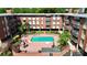 Aerial view of the apartment building's clean pool and surrounding patio at 1300 Queens Rd # 409, Charlotte, NC 28207