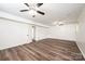 Spacious basement area with luxury vinyl plank flooring and modern ceiling fans at 1309 Poplar Cir, Newton, NC 28658