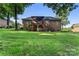 A spacious backyard showcases a two-story covered deck and well-manicured lawn at 1622 Brookstone Dr, Hickory, NC 28602