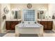 Bathroom featuring double sinks, soaking tub, and natural light at 1622 Brookstone Dr, Hickory, NC 28602