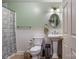 Cozy bathroom featuring a pedestal sink, and patterned shower curtain at 1622 Brookstone Dr, Hickory, NC 28602