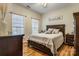 Comfortable bedroom with wood floors and plenty of natural light at 1622 Brookstone Dr, Hickory, NC 28602