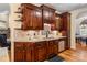 This kitchen features wooden cabinets, granite countertops, and stainless steel appliances at 1622 Brookstone Dr, Hickory, NC 28602