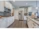 Modern kitchen featuring white cabinetry, stainless steel appliances and center island at 1630 Riddle Ext, Clover, SC 29710