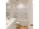 Bathroom featuring double sink vanity with white cabinets and a walk-in shower at 1821 Augustine St, Monroe, NC 28112