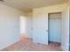 Bedroom featuring neutral carpet, large closet, and a bright, airy feel at 1821 Augustine St, Monroe, NC 28112
