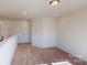 Comfortable bonus room with plush carpet, recessed lighting, and neutral color palette at 1821 Augustine St, Monroe, NC 28112