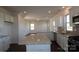 Modern kitchen featuring granite countertops, stainless steel appliances, and stylish backsplash at 1821 Augustine St, Monroe, NC 28112