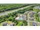 Aerial view of neighborhood amenities, including a community pool, clubhouse, and riverside views at 2052 Masons Bend Dr, Fort Mill, SC 29708