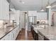 Eat-in kitchen featuring stainless steel appliances, a farmhouse sink, and a large island at 2052 Masons Bend Dr, Fort Mill, SC 29708