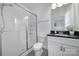 Bathroom featuring a shower with sliding doors, a toilet, and a white vanity with black countertop at 2148 Nims Village Dr, Fort Mill, SC 29715